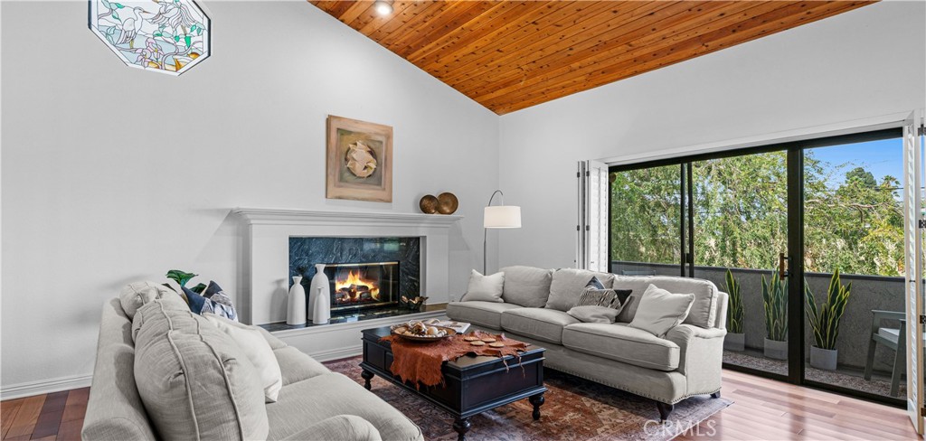 A beautiful, remodeled home with a breathtaking view in the highly desirable Franklin Hills of Los Feliz. This home contains 3 Bedrooms and an Office space or Den that can be used as a 4th bedroom as well as 2.5 bathrooms. Beautiful hardwood floors are laid out throughout the entire home with tile on the entry level and the bonus room/office/Den. Living room has gorgeous wood-vaulted ceilings, balcony, and a lovely fireplace to enjoy during the winter season. The split-level dining room leads to a large, fully remodeled kitchen with fresh white cabinets and black granite counter tops for a stunning contrast and a luxurious feel. The Family Room opens to the patio as an outdoor living area to enjoy the beautiful California sun! The 3 bedrooms are on top floor, including the spacious master suite that has a private balcony and wood-vaulted ceilings. The Master suite also comes with brand new, tastefully remodeled bathroom with a separate shower, a free-standing tub, and a double vanity with plenty of counter space. A large outdoor space on a moderate slope is located right outside the sliding doors from the master bedroom. The backyard can potentially be put to a good use by building a new larger deck or extending the existing one, or it can also be left in its natural state to enjoy the light forest atmosphere. The choice is yours, but the opportunities are endless!
Some additional features in this picturesque home include recessed lights, a huge indoor laundry room, newer HVAC unit, wood-vaulted ceilings throughout, and a 2-car attached garage. Washer, Dryer and Refrigerator are included.
The home is surrounded by excellent schools with the “10 out of 10” rated Ivanhoe Elementary School, the highly rated Film & Media Magnet Thomas Starr King Middle School, and The Magnet John Marshall High School.
Don’t miss out on these spectacular views and this picturesque home in the heart of Los Angeles, because it will go fast!