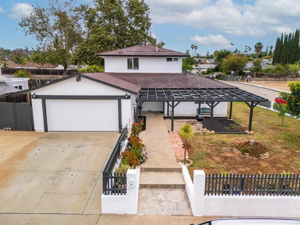 2-Level Home on a Corner Lot | Welcome to 1220 Hoover Street, a well-maintained 2-story home on a desirable corner lot in the heart of Escondido. This 4-bedroom, 2-bathroom residence offers 1,399 sq ft of functional living space with a flexible layout for today’s needs. Property highlights include a freshly painted exterior, dual-pane windows, and a brand-new furnace. Energy efficiency is enhanced with 12 solar panels, providing lower monthly utility costs. The home’s floor plan features bedrooms on both levels, ideal for multigenerational living, guests, or a dedicated home office. A spacious yard offers room for entertaining, gardening, or outdoor activities, while a wide side gate provides convenient access for additional parking, storage, or small equipment. Located near shopping, dining, schools, and major commuter routes, this property combines comfort, efficiency, and convenience. Schedule your private showing today and discover all that 1220 Hoover Street has to offer.