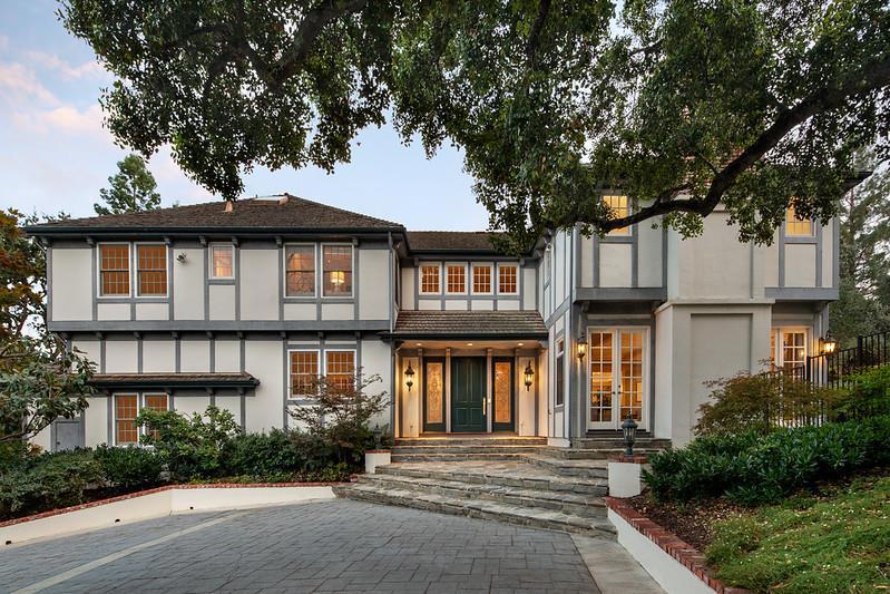 Gated estate at the end of a cul-de-sac w/fairway views of the Sharon Heights Golf & Country Club. Timeless elegance on 1.2 acres w/grand main residence, guest house, pool, spa, & tennis court. Extra-large rooms designed for entertaining on a grand scale. Beautifully remodeled kitchen, tremendous family room with full entertainment bar. There is a 750 bottle wine room. Main level libraryoffice & bedroom suite, lavish upstairs primary suite w/separate sitting area/office & 2 full baths + 3 additional suites (one presently used as an office) & fitness center. Garage parking for 3 cars + large storage room. All fireplaces are equipped w/gas logs, but are wood burning. Solar powered electricity. The tennis court is striped & net can be adjusted for pickleball. There is also a basketball hoop. It is overlooked by the studio guest house. Atherton is the #1 ZIP code in the country close to Stanford University and Sand Hill Road venture capital centers. Excellent Las Lomitas schools.