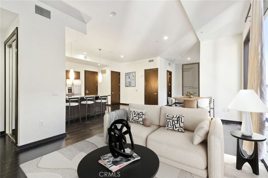 Sleek & Modern Loft-Style Living in DTLA

Welcome to 655 S Hope Street, where contemporary design meets the energy of Downtown LA. This stunning 2-bedroom, 2-bathroom loft-style condo features a wide-open floor plan with soaring ceilings and a seamless flow between living, dining, and kitchen areas. The sleek, modern kitchen boasts stainless steel appliances and quartz countertops, perfect for entertaining or creating your ideal live/work space. Both bathrooms offer a clean, modern design for comfort and functionality. Enjoy the convenience of a fully equipped fitness center and the rare luxury of one dedicated parking space. Located in the heart of Downtown LA’s Financial District, you’re steps from top restaurants, shopping, and entertainment. This is DTLA loft living at its finest—sophisticated, stylish, and effortlessly connected.