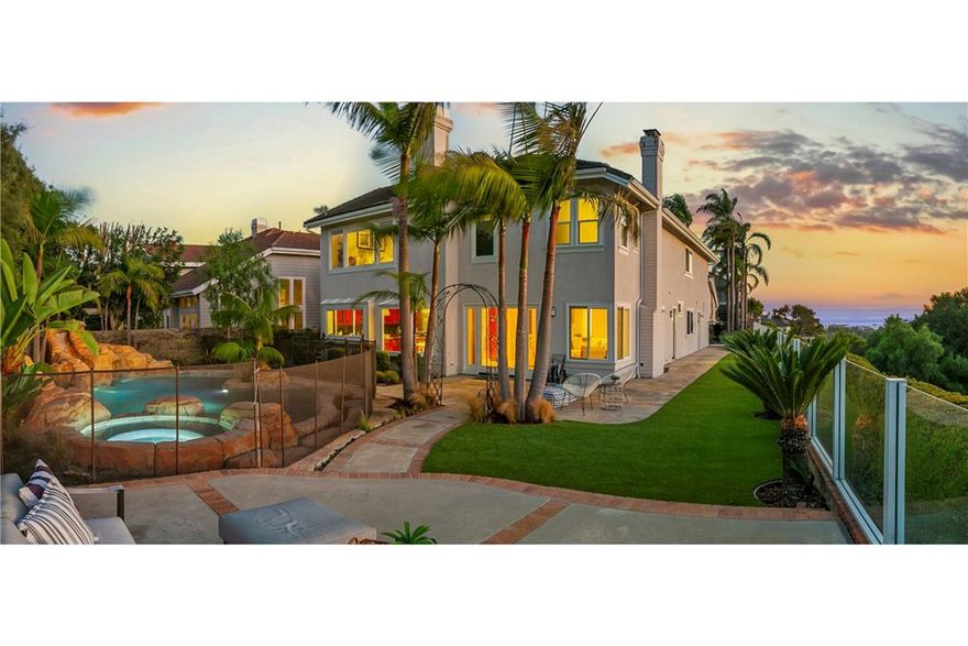 OCEAN VIEW HOME! Welcome to this exceptional 5 bedroom, 3 bathroom home in the highly sought-after San Marin community of Laguna Niguel. Perfectly positioned on a premier lot, this property offers sweeping hillside and ocean views that create a sense of peace and privacy both day and night.  Step inside to find a bright and open floor plan with spacious living and dining areas, soaring ceilings, and abundant natural light. The family room—anchored by a cozy fireplace—flows effortlessly into the kitchen, making it ideal for entertaining. A main-level bedroom and full bath provide convenience for guests or multi-generational living.  Upstairs, the expansive primary suite has a spa-like ensuite bathroom and generous closet space. Three additional bedrooms complete the upper level, offering plenty of room for family, a home office, or creative space.  The backyard is designed for both relaxation and entertaining, where you can enjoy coastal breezes, sunset/ocean views or take a dip in the large pool with waterslide and water falls making you think you are on vacation every day of the year.  Located in one of Laguna Niguel’s most desirable neighborhoods with some of the LOWEST PROPERTY TAX RATES you will find in California, 1 Pacifico offers easy access to award-winning schools, local trails, shopping, dining, and is just minutes from world-class beaches and resorts.  This home combines comfort, location, and views—making it a rare opportunity you don’t want to miss.