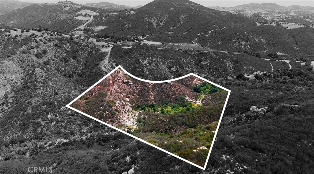 Unmatched Privacy & Panoramic Views – 19.97 Acres in La Cresta Highlands
Experience the ultimate escape on nearly 20 acres in the prestigious Santa Rosa Plateau. This stunning parcel offers rough-graded pads for easy viewing, breathtaking mountain panoramas, and your very own seasonal stream meandering through the property. Hike, explore, and enjoy total serenity —your private sanctuary awaits.
Build a dream compound, dream estate, or retreat, with plenty of room for guest homes, gardens, or equestrian facilities. Previously HOA-approved architectural plans will be transferred to the new owner, giving you a head start on creating your vision.
Despite its serene, retreat feel, this property is just minutes from the La Cresta entrance, shopping, dining, hospitals, and the 15 Freeway. Paved roads lead to the parcel, city water is at the street, and Temecula Wine Country is only a short drive away.
La Cresta offers so much more than land—it’s a lifestyle. Enjoy open spaces, starry skies, and community amenities like private trails, social activities, and access to thousands of acres of ecological reserve. All less than 1.5 hours from LA, San Diego, Orange County, Palm Springs, and Big Bear.
This is more than a property—it’s your chance to live the La Cresta dream. Priced to sell—don’t miss it!