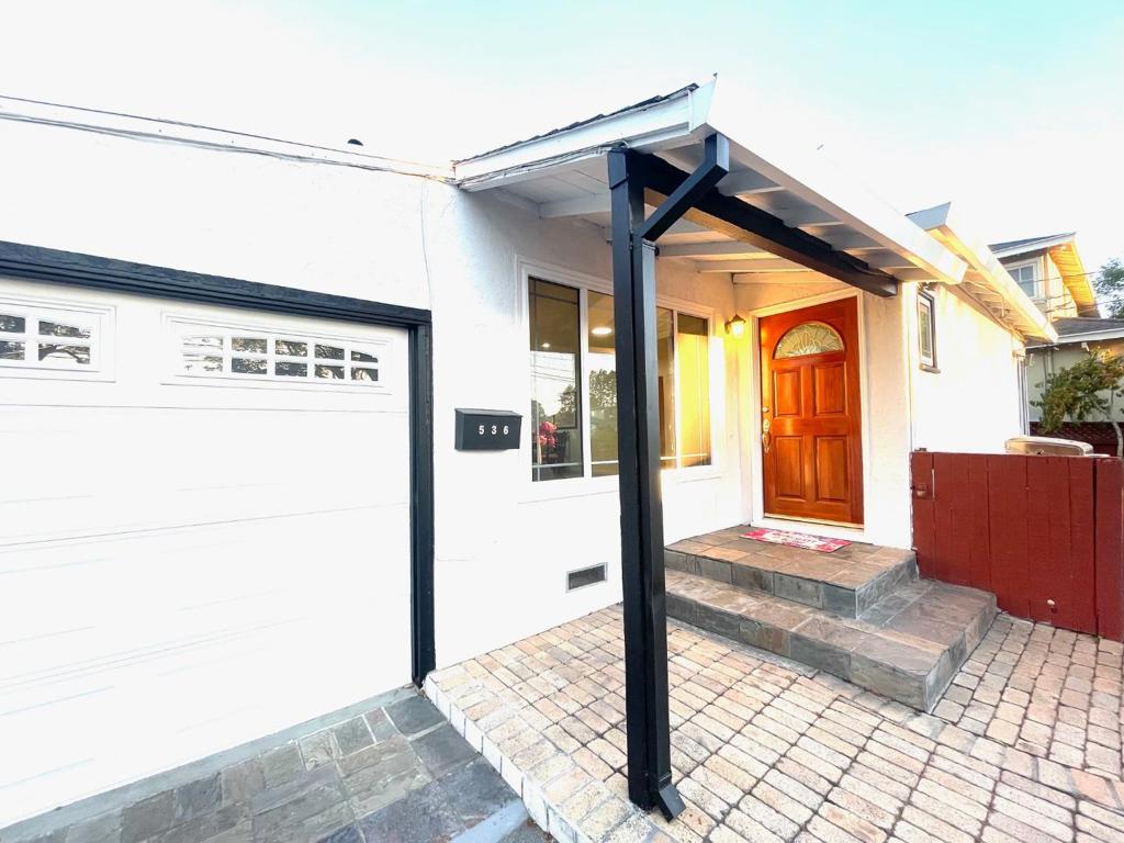 4 bedrms 2.5 bathrms, size 1575sf, Lot 5500 sf. 1 car garage. 1 Storage. A sunroom. Single family house in a nice neighborhood! Very close to Costco (4-5 minutes walking distance), Recently remodeled kitchen, bathrooms, bedrooms, Sunroom, storage room. Living room, Dining area. A fireplace in Living room. Central heating each bedrooms and bathrooms. Front / back yard is mostly covered by Concrete or Breaks. Lots of fruit trees: Lemon, Orange, Peach, Plum, Chicago Hardy Fig trees. Fence was recently painted to prolong life. A big Camphro tree at front yard is managed by redwood city ( resident can request city to trim or cut the tree any time). The house lot is bigger & wider than neighbor's. It can park 5 cars at front yard,curbside can park 2 cars. A finished storage shed at back yard. A tall orange tree produce orange all year round. about 5 peach trees also produce some good peaches each year. You can enjoy California sun shine at front yard, back yard.