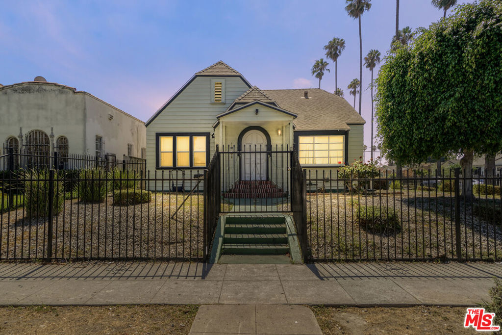 STUNNING FOURPLEX IN AN OPPORTUNITY ZONE! Exceptional value-add investment opportunity in Chesterfield Square, centrally located south of USC and minutes from SoFi Stadium, Leimert Park, Exposition Park, West Adams, and Downtown Los Angeles. Nestled on a palm-lined street just a short walk to Chesterfield Square Park, this well-maintained property blends charm, space, and income potential.The front 3-bedroom, 2-bath residence has been completely remodeled, showcasing modern finishes, an open and inviting layout, updated kitchen and baths, and abundant natural light. Perfect for an owner-user or high-quality tenant, this home is move-in ready and adds tremendous appeal to the property.The three detached rear units each feature well-proportioned layouts with updated touches, providing immediate rental income plus substantial upside. The corner lot measures 7,282 sq. ft. with approx. 4,400 sq. ft. of living space, zoned LARD1.5, offering excellent future development potential.Additional highlights include refreshed interiors, off-street parking, and landscaped surroundings that boost curb appeal. With stable in-place income, significant rental upside, and a location within a designated Opportunity Zone offering potential tax benefits, this property is a rare find for both investors and owner-occupants.