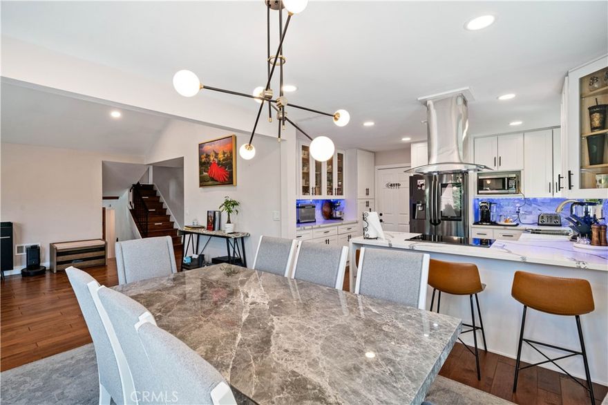 Just in time for the holidays, experience the charm of this beautifully maintained single-family residence, where comfort, sophistication, and functionality come together in perfect harmony. Boasting four spacious bedrooms, three tastefully updated bathrooms, and an inviting open-concept design accentuated by soaring vaulted ceilings, this home offers an exceptional setting for families, entertainers, and remote professionals alike.



Step inside to discover gleaming floors, abundant natural light, and a modern kitchen appointed with premium appliances and a delightful breakfast nook. The private backyard oasis is a true retreat — featuring a sparkling pool surrounded by mature hedges for added privacy, and generous space for both relaxation and year-round entertaining.



Additional highlights include an attached garage for convenience and storage, all situated on a generous lot within a peaceful, welcoming neighborhood. Enjoy the ease of walking to nearby parks, top-rated schools, shops, and dining, with effortless access to major freeways for a seamless commute.



This turnkey haven offers the lifestyle you’ve been dreaming of — stylish, spacious, and ready to move in. Don’t miss the opportunity to make this stunning property your new home.