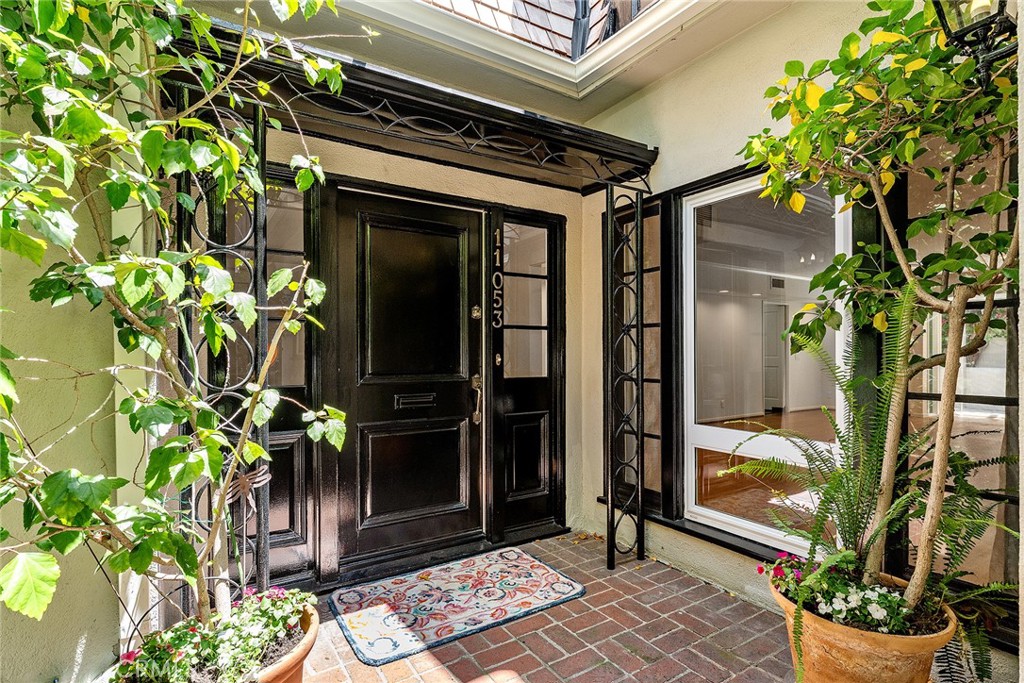 I SIMPLY CAN'T! REALLY? LIVING IN A TOWNHOUSE IN WESTWOOD? ONE OF ONLY THREE IN THIS VERY COOL, SPECIAL SETTING! Enter through the Gated Brick Courtyard Garden privy to ONLY three homes. This Stunning Two-Story unit is 2745 sq ft, has 3 Bedrooms and 3.5 Baths, Original Oak Flooring and an Abundance of Natural light! Walk into this Luxury Home and to the left find a Spacious Living Room with gorgeous Front Facing Windows, Fireplace, Built-In Bookshelves and Cabinetry. Great Room is to the right with Major Dining Space, another (Yes, ANOTHER) Fireplace, Massive Garden Windows and Doors to the Outside Patio. Gourmet Cook's Kitchen with Fabulous Wolf Range, Breakfast Area and Lots and Lots (did I say LOTS) of Cabinets for storing anything and everything! Upstairs find All Three Bedrooms. Primary Suite is grand with built-ins, Full Bath, Dressing area and Doors opening to Juliette balcony! Second Spacious Bedroom, also Ensuite, with Mirrored Closet Doors and lots of Natural Light. Third Bedroom - or can be an office - has Ensuite Bath, Closet, Built-in Bookshelves and Desk. The Laundry Area is found Upstairs with attached Sewing/Crafting room. Rear Private Garden Patio is Perfect for Entertaining! This Townhouse is within walking distance to everything! walk to UCLA, Westwood Village and much more! You've Gotta See It to Believe it! * Some photos are virtually staged.