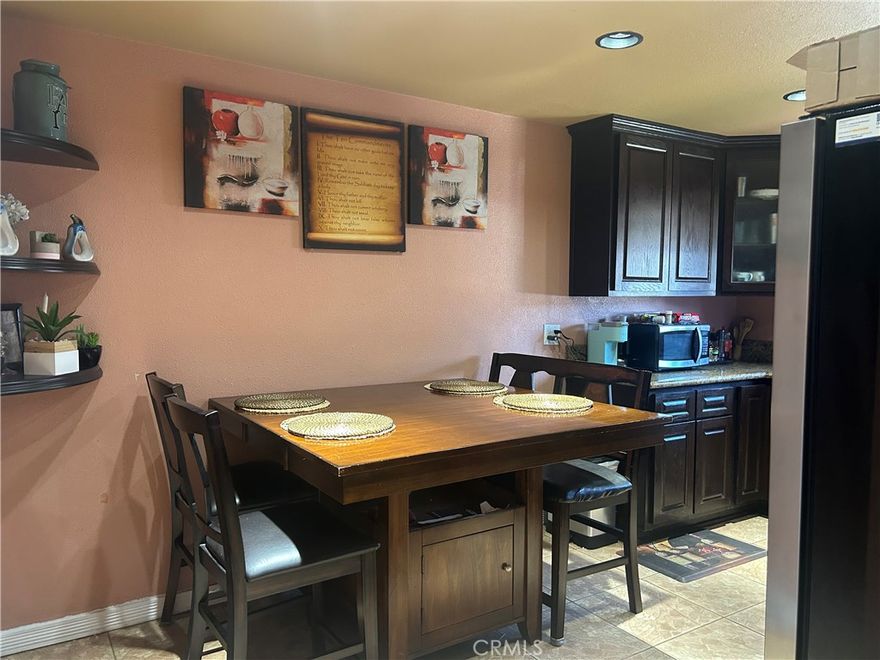 BEST PRICE in the heart of  CITY OF CARSON.  Be close to work, 405 &  110 freeway and shopping centers.   This is an spacious 3 bedrooms home,  One Bedroom downstairs with a full bathroom.  The other 2 bedrooms are upstairs with a full bathroom.  Direct access from the extra large two car garage.  Laundry area is in the garage.  The HOA includes water and yard maintenance.  Tile floors in the kitchen and bathrooms.  Do not miss this opportunity and call for your private showing.  Must see.  It is Unit 40    The address is 40 Camelback South.  Carson.  Thank you.  Must See