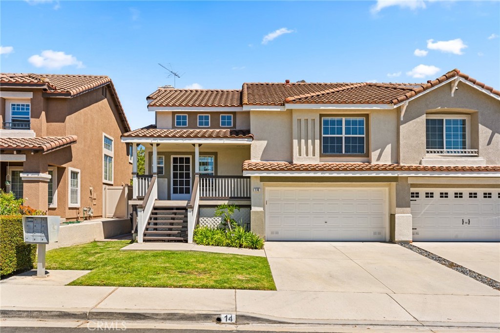 Don't miss your chance to own this beautiful home nestled in the vibrant California Tesoro community of Rancho Santa Margarita. This split-level 4-bedroom, 2.5-bathroom residence offers an ideal blend of comfort, functionality, and Southern California charm. Step inside to find an open-concept floor plan with soaring ceilings and plenty of natural light. The upper level features a spacious living and dining area that flows seamlessly into a well-appointed kitchen featuring ample cabinetry, and counter space. The primary suite is a true retreat, with vaulted ceilings, a generous walk-in closet, and an en-suite bathroom with dual vanities and separate water closet. The lower level consists of three additional bedrooms that share a full bath. A secondary living area can be used as flexible space as well, great for an office or game room. Additional highlights include an attached two-car garage with direct access, a low maintenance back yard with turf and a storage shed. Situated near award-winning schools in the sought-after Capistrano Unified School District, minutes from shopping, dining, and the 241 Toll Road, this home delivers both convenience and exceptional value. With only one low HOA, residents have access to an array of exceptional amenities including swimming pools, sports courts, and lush parks, including the Santa Margarita Beach Club and Lagoon next to the lake. Make this serene home yours and experience the best in Rancho Santa Margarita living.