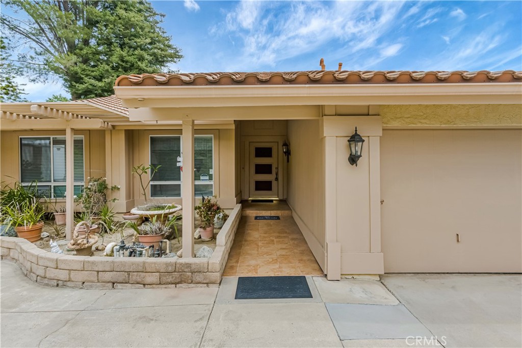 Charming Single-Story Home with Golf Course Views of the Porter Valley Country Club - this beautifully maintained home, with breathtaking views of Hole #4 has expansive outdoor space, a versatile layout, and offers privacy, comfort, and the potential to create your dream retreat. Highlights include 4 Bedrooms (or 3 + Convertible Den), very private flag Lot with RV access & ample parking, panoramic sunset views, huge lot with downslope for terrace potential. Step into the formal living room with expansive windows framing scenic backyard and hillside views. The family room features a cozy fireplace and wet bar, ideal for relaxing evenings or entertaining guests. The cook’s kitchen offers abundant cabinet and counter space, seamlessly flowing into the formal dining room, which adds a touch of classic elegance to your gatherings. Versatile fourth bedroom currently used as a home office. Bright and airy floor plan with generous natural light. Single-level convenience with excellent indoor-outdoor flow. RV parking and large driveway with flag lot privacy
This home combines classic charm, modern potential, and a premier location—ready for you to enjoy or personalize. Whether you're looking for a peaceful retreat, a golfer's paradise, or a place to entertain, this property is a rare find.