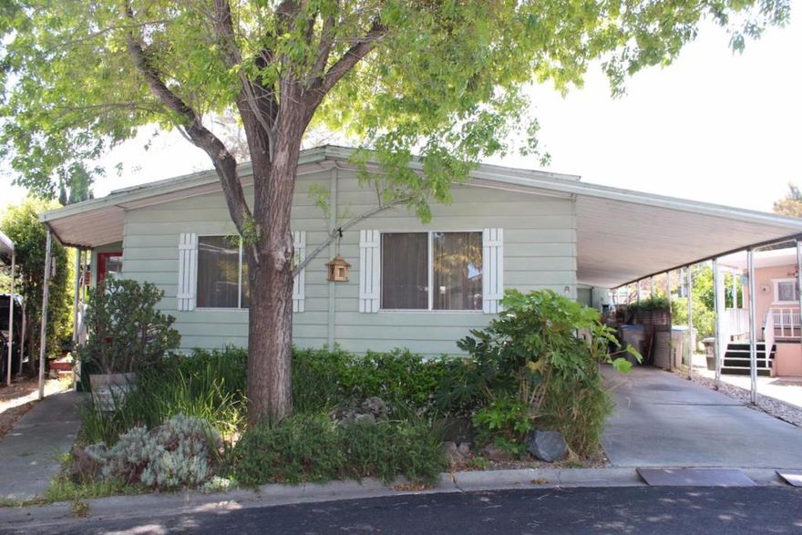 Beautiful 2 bed /2 bath home, serial # 7368RX57MCAB/A. Laminate flooring throughout. Separate family room and living room. Eat in kitchen includes refrigerator, dishwasher, stove/oven, disposal, pantry, and ceiling lights. Guest bedroom with carpet flooring. Guest bathroom with tub and shower. Master bedroom with carpet flooring and mirrored closet. Master bathroom with separate tub and shower and double sinks. 3 car carport parking.