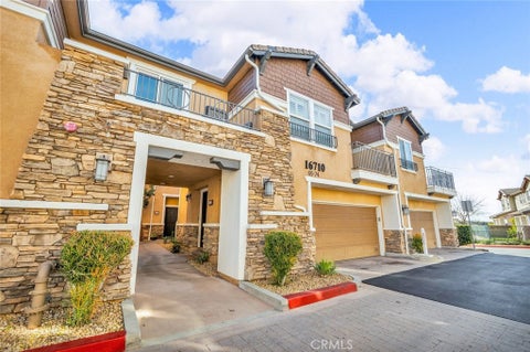 Photo of 16710 Nicklaus Drive #70, Sylmar, CA 91342 (MLS # SR26221928)