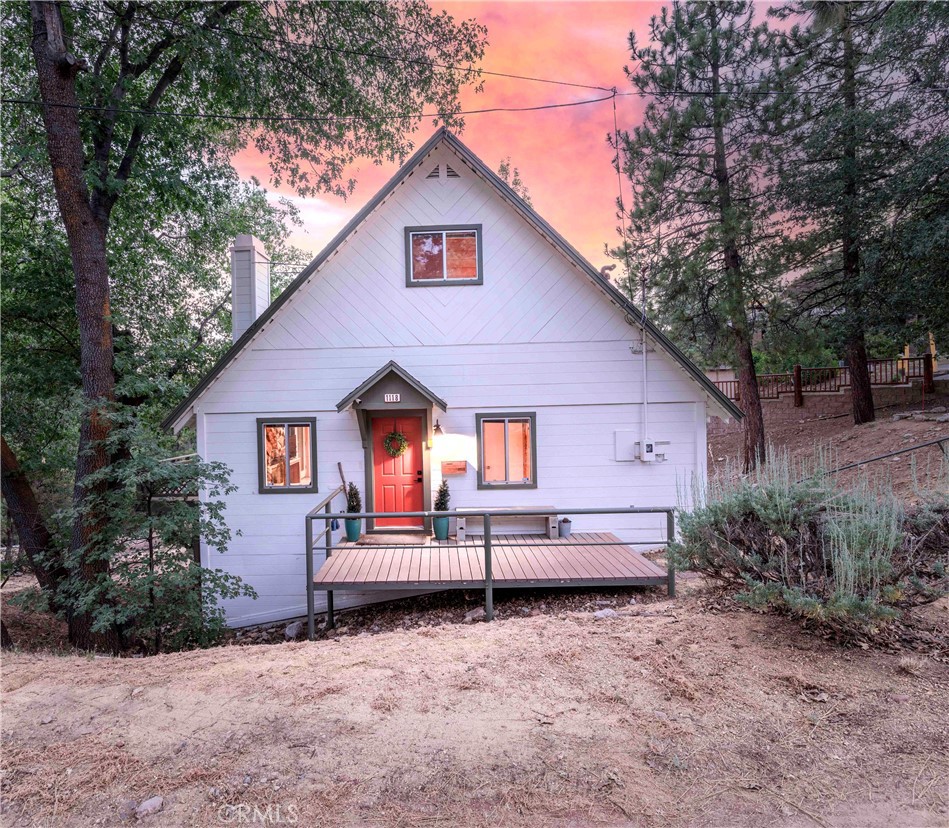 Beautiful LAKE VIEWS!!!! You don't want to miss this opportunity to own your very own cabin in the woods ~ Located on the North side of Big Bear Lake in the quaint town of Fawnskin, just ten minutes from the heart of Big Bear ~ Step inside and be instantly captivated by the warmth of knotty pine interiors and high ceilings ~ Bathed in natural light, every corner of this home invites comfort and connection ~ The remodeled kitchen blends modern elegance with mountain charm, while both updated bathrooms offer style and sophistication ~ Retreat to the spacious primary suite, where mornings begin with breathtaking lake views and evenings end in quiet serenity ~ The generous living and family areas open seamlessly to a 400+ sq. ft. wraparound deck ~ your front-row seat to glimmering waters of Big bear Lake, sunsets, stargazing, and unforgettable gatherings under the open sky ~ Every room offers a view, making this home not just a place to live, but a place to feel alive ~ Whether you’re hosting friends for a weekend getaway, or dreaming by the fireplace as snow falls outside, this home captures the essence of mountain living ~ With a large, gently sloped lot offering space to build a garage or the potential for expansion alos your very own sledding hill in the winter this property is as practical as it is picturesque ~ Moments from Captain John’s Marina and Big Bear’s renowned dining, shopping, and outdoor adventures, yet worlds away in feel~ this is more than a home, it’s a lifestyle, an investment, and a sanctuary rolled into one ~ Make this space yours ~ Boat and jet ski rentals are just minutes away at Captain John's Marina ~ The pride of ownership this homes shows speaks for itself.
