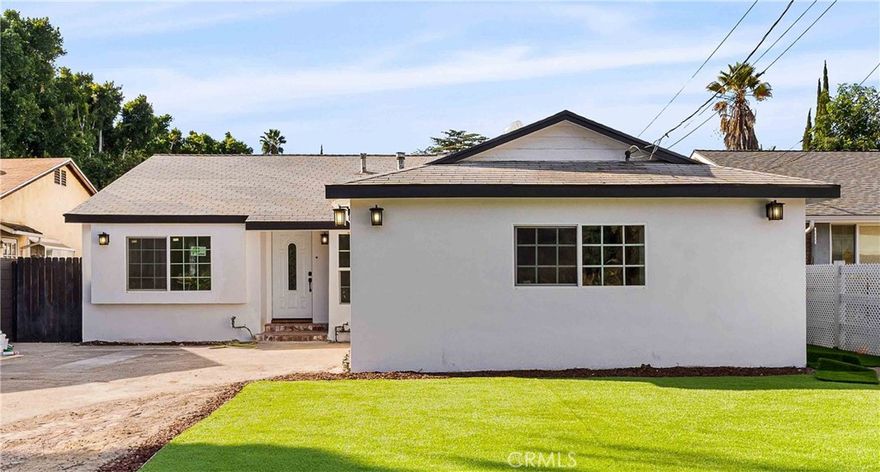 Welcome to this enchanting, meticulously remodeled single-story home nestled in Valley Village. Boasting an ideal, convenient location nearby all of the amenities you need, commuter friendly and great school district. This move-in ready haven is just a short 5-10 minute drive from local shops, schools, and essential establishments, placing your family at the center of convenience. Step inside to experience fresh modern finishes, LED lighting, plank flooring, and custom bathrooms elevate your living experience. The large backyard becomes your private haven, located in a quet cul-de-sec. Ready for gatherings and making lasting memories. This home is a sanctuary for those seeking a convenient lifestyle and the benefits of a new home, stress-free living. Your new abode ensures a stress-free 5-minute drive to the freeway, streamlining a commute. Quick access to the vast job market of Los Angeles, while still savoring the tranquility of home. Picture yourself in a low-rise neighborhood, shielded from towering structures, creating an intimate and serene atmosphere within the confines of your own oasis. It is very well maintained by the residents and you can tell that everyone is very happy to be living here.