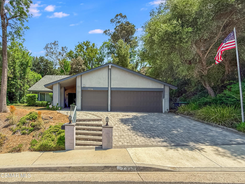 A true diamond in the rough with unlimited potential! Tucked in the scenic Santa Monica Mountains, this peaceful Liberty Canyon retreat offers rare privacy, space, and community charm--all within the award-winning School District. The versatile layout features a main-level primary en-suite, a half bath downstairs and three additional bedrooms and full bathroom upstairs, making it perfect for multi-generational living. Other highlights include 2 story ceilings in the living room with a cozy fireplace, dual-pane windows, an updated kitchen with granite countertops, tons of cabinets and Viking stainless steel appliances, and a spacious 3-car garage. The expansive backyard boasts ample room to entertain and relax--with an above-ground hot tub for year-round enjoyment. No HOA or dues! Enjoy Liberty Canyon's vibrant community spirit, celebrated holidays, and close proximity to hiking trails, Malibu beaches, and Calabasas conveniences. This home is ready for your finishing touches and is a rare opportunity to own in one of Agoura Hills' most coveted neighborhoods ! Some photos have been digitally staged.