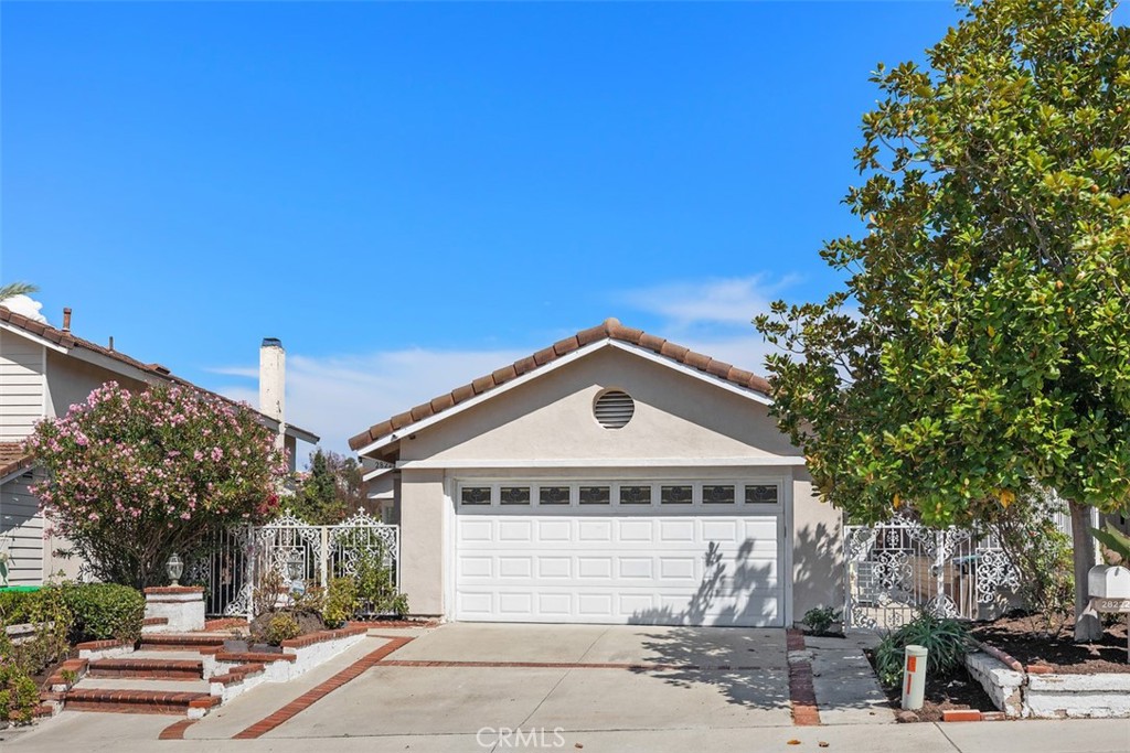 This 3-bed / 2-bath single-level home has a VIEW from your spacious backyard with mature apple, pomegranate, and fig trees. The interior has been remodeled with vinyl plank flooring and new bathroom vanities. The large master bedroom opens via glass slider straight to the backyard. The 2 additional bedrooms could also make a great home office. The home enjoys an abundance of natural light. Great location with convenient access to the 5 freeway, 73 toll road, Laguna Niguel Regional Park, and Aliso and Wood Canyons Wilderness Park. Less than 5-minute drive to Costco, Whole Foods, Home Depot, Walmart and Sprouts. Your lease includes membership to The Club at Rancho Niguel, a wonderland with 2 pools, 2 hot tubs, 7 tennis courts, 6 pickleball courts, a basketball court, 2 volleyball courts, 2 racquetball courts, a play structure, a clubhouse, grassy field and a gym. This is your opportunity to live in a wonderful home in a great neighborhood. Schedule your tour today!