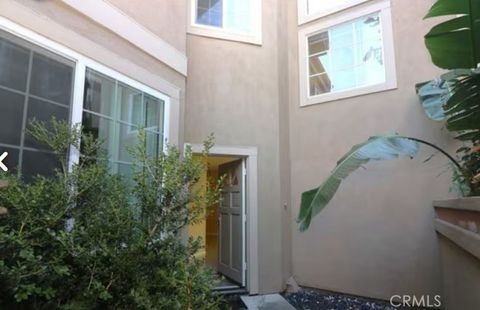 Photo of 72 Cartier Aisle, Irvine, CA 92620 (MLS # OC26099021)