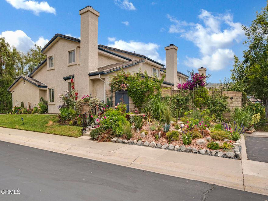 Step into a home that blends natural light, thoughtful layout, and comfortable elegance to create a relaxing and effortless living experience. Upon entry, you're welcomed by a bright, open space with large windows that invite the outdoors in. The living room flows seamlessly into the dining area, creating a sense of continuity, further enhanced by custom crown molding, adding an elegant, refined touch to the ground level.The kitchen is smartly designed with modern cabinetry, ample counter space, and an intuitive layout that makes meal prep and entertaining a breeze. It's close proximity to the dining area ensures that you will stay connected with guests while hosting.A versatile downstairs bedroom offers flexibility as a guest suite, office, or private retreat.  Included is a nearby full bath and direct access to your private back yard area via sliding glass doors. Vaulted ceilings throughout amplify the home's sense of openness and light.Upstairs, the spacious primary suite features vaulted ceilings, a generous walk-in closet, and a private en-suite bath, creating a serene and restful retreat. The upper-level layout is designed for privacy as the  bedroom is tucked away from the downstairs gathering spaces.The backyard is a true highlight. Previous owner used back yard garden area for organic vegetable gardening, successfully growing seasonal vegetables for the past 14 years. Besides plenty of colorful, ornamental plants, this rare feature (availability of existing fertile soil built-up) offers a unique opportunity for eco-conscious living and plentiful, healthy future veggie harvests for the new owner. Set in one of the community's more private and tranquil locations, this home also features a more intricate and lush public landscape design than most surrounding units, perfect for those who value artistic expression, seclusion, and pure natural beauty.HOA amenities include exterior maintenance, insurance for the tile roof, and access to the beautifully furnished pool area and clubhouse which are conveniently located right next door.This home also offers exclusive use of both the backyard and a portion of the front area, adding valuable outdoor space rarely available in similar communities.