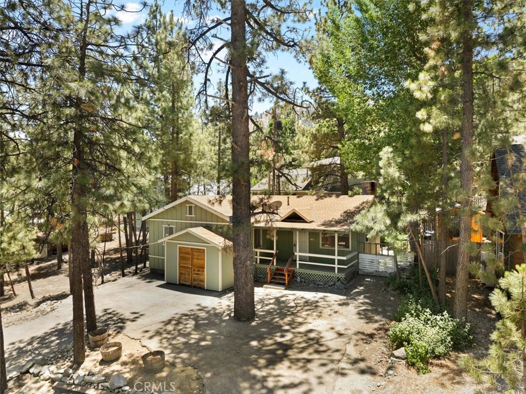 This single-story floor plan makes this a great starter home or weekend getaway. Spacious living room has corner brick fireplace to enjoy on cold winter evenings. Living room is open to the kitchen complete with breakfast bar, pantry, gas range/oven and refrigerator. Both bedrooms are conveniently located next to a bathroom. Front bedroom is adjacent to full bath with tub/shower combo. Next to the kitchen is the over-sized laundry room which could also serve as an office, craft/sewing room or ... Walk through laundry/bonus room to second bdrm and bath which offer wonderful privacy from the rest of the home. Forced air heat and ceiling fans will help keep you warm in the winter and cool in the summer. Front and rear decks to enjoy the outdoors and circular driveway provides plenty of parking. Great commuter location on Thrush between Lone Pine Canyon and Sheep Creek Rd.
Come see all this home as to offer at $375000.00.