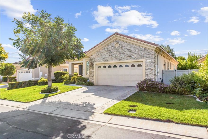 Come & Enjoy the Relaxed & Active Lifestyle at Solera!  You Will Love this UPDATED & MODERN 2 Bedroom + OFFICE Floor Plan with Just the Right Size Back Yard... Not too Much to Maintain But Enough to Have a Grassy Area for the Pup and Some Amazing FRUIT TREES!!  The BRAND NEW LAMINATE FLOORING is Just Gorgeous and Runs Throughout the Entire Home!  Everyone Loves the Very Popular Trillion Floor Plan with the Extra Office that Can Be Used as a 3rd Bedroom and the Open Living Areas with High Ceilings that are so Inviting!  The Kitchen Has Quartz Countertops, an Eat-in Breakfast Bar and Soooo Much Storage!!  The Master Suite Has a Soaking Tub, Separate Standup Shower & a Huge Oversized Closet!  Laundry Room is Just off of the Kitchen, Conveniently Connected to the Garage.  Solera is the Best Gated 55+ Community Around with a Fabulous Clubhouse, Golf Course, State-of-the-Art Fitness Center, Tennis Courts, Bocceball, Pool and Lots of Activities!  What a Great Community!  Come by & See this Amazing Home Today!