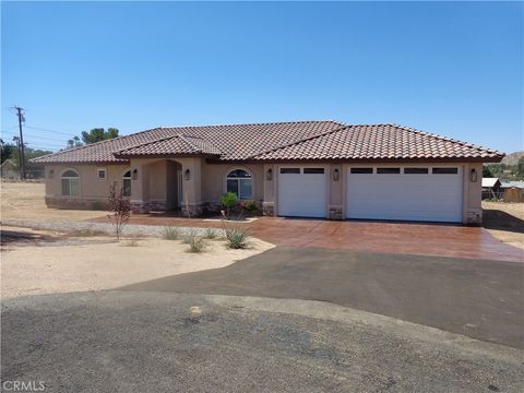 Photo of 18255 Winnetka Road, Apple Valley, CA 92307 (MLS # CV26039873)