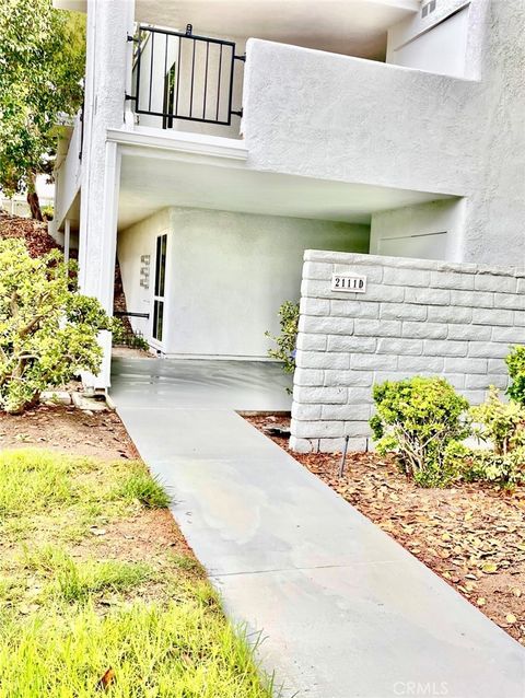 Photo of 2111 Via Puerta #D, Laguna Woods, CA 92637 (MLS # TR26091378)