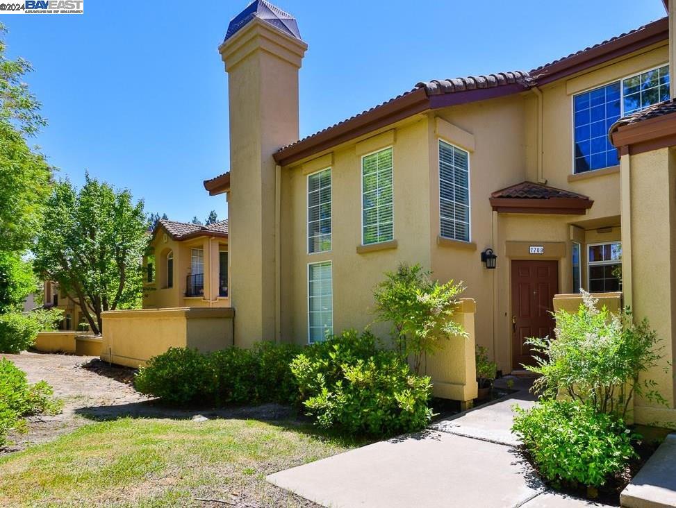 Beautifully updated 3beds/2baths Townhouse featuring an open floor plan. One bedroom and full bath located on first floor. Updated kitchen with quartz counter tops, stainless steel appliances, and a pantry. This corner unit features Vaulted ceilings with ample natural light and updated laminate flooring downstairs and carpeting upstairs. Enjoy the comfort of Central Cooling and Heating as well as modern ceiling fans/lights in every room. The HOA covers water and trash removal services. Attached one car garage with washer/dryer hookups, custom designed cabinets for storage, and one assigned parking space. The community pool is located near the unit. A plush green park is located just across the street with playgrounds, basketball court, and recreation area. Easy commute and just minutes to local schools, major freeways, BART, shopping, and restaurants. Your New Home Awaits!