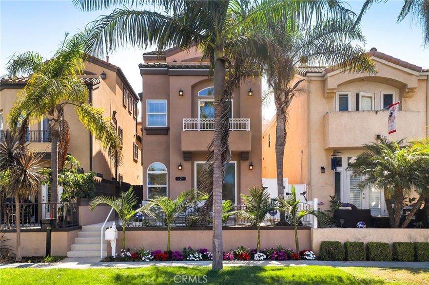 Nestled on one of the quietest, most upgraded, and coveted streets in the heart of Downtown Huntington Beach, this stunning three-level residence is mere steps from the beach, one block from serene Lake Park, and a short stroll to vibrant Main Street, Pacific City, and award-winning schools. A spacious elevated front patio greets you, setting the stage for the bright, airy open floor plan within. The first floor seamlessly connects the living room, two outdoor entertaining areas, family room, kitchen, and dining area, all bathed in natural light. The modern kitchen shines with all-new appliances, a walk-in pantry, and a convenient laundry room. Ascend to the second level to find a generous family room with soaring high ceilings, a luxurious primary suite, and two additional Jack-and-Jill bedrooms, ideal for family or guests. The third level offers a versatile space with a private oversized balcony, perfect for relaxation or entertaining. Blending coastal charm with modern elegance, this home delivers the ultimate Huntington Beach lifestyle in an unparalleled location.
