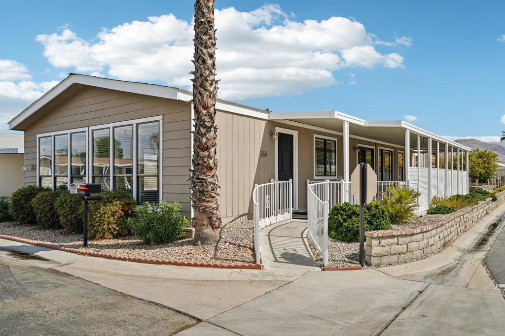 Welcome home to this beautiful 2 bedroom, 2 bath manufactured home offering over 1,500 sq. ft. of comfortable living, ideally situated on a desirable corner lot in a welcoming senior (55+), owner-occupied (no rentals) park community. The open and airy floor plan is filled with natural light, creating a warm and inviting atmosphere throughout. Generous living, dining area, and den flow seamlessly, making it easy to relax or entertain, while the well-designed laundry room with extra cabinetry adds everyday convenience. Outside, you'll appreciate the two-car covered carport, a separate storage unit for tools, bikes, or seasonal items, and a spacious covered patio that provides the perfect spot to enjoy your morning coffee or take in the evening's western sunsets. This resident-owned community offers a lifestyle centered on comfort and connection. Enjoy resort-style amenities including sparkling pools and large soothing spa, year-round heated and cooled shuffleboard courts, billiards, card room, fitness room, tennis and pickleball courts, and a beautifully updated clubhouse that hosts a wide variety of social activities and events. With the added privacy of a corner lot, the benefit of an additional storage unit, ample guest parking, and the peace of mind of an owner-only community, this home combines comfort and convenience to provide the buyer with an ideal opportunity to embrace desert living at its finest. Potential residents of The Canyon will be asked to show a credit score of 750 and a monthly income of three (3) times the average monthly space rent of $945. Pets are permitted; dogs need to be under 20 lbs, unless it has a service dog certification. Other information is available Mon-Fri from the office located in The Canyon.