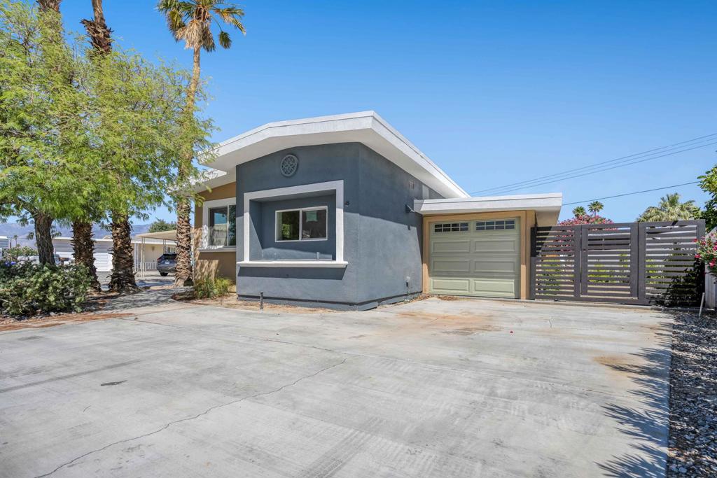 Welcome to this beautifully remodeled 2-bedroom, 2.5-bath manufactured home in the highly sought-after 55+ community of Tri Palm Estates in Thousand Palms. Ideally situated within a vibrant golf course neighborhood, this home blends modern style with functionality and resort-style amenities.Step inside to discover a freshly updated interior featuring new flooring, updated lighting, fresh paint, and contemporary finishes throughout. The spacious layout includes a primary suite with a large en-suite bath and an additional guest half-bath. The secondary bedroom suite, complete with its own full bathroom and private entrance, offers excellent flexibility for guests.The remodeled kitchen showcases quartz countertops, custom cabinetry, and a stylish tile backsplash, perfect for both everyday living and entertaining.Designed for comfort and privacy, the home features dual private entrances--ideal for independent living spaces or shared occupancy. Outdoors, enjoy the tranquility and warmth of a community designed for active adults.Residents of Tri Palm Estates enjoy two golf courses, swimming pools, spas, tennis courts, a clubhouse, and year-round social activities. Whether you're seeking a primary residence or a seasonal retreat, this home offers it all.Professional photos coming soon.