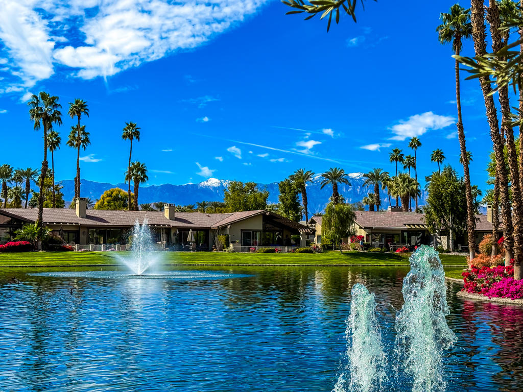 Rare South-Facing End Unit Condo with Breathtaking Water & Mountain Views!Nestled at the end of a tranquil cul-de-sac, this beautifully maintained condo offers unparalleled privacy and serenity. With sweeping water views and a lovely mountain backdrop, it's the perfect setting to unwind. Just steps from the community pool and surrounded by newly landscaped grounds, including a charming path that winds between two picturesque lakes, this home is a peaceful retreat.Still owned by the original purchaser, this condo has been lovingly cared for and is ready for someone to make it their own. The well-maintained original features are clean and inviting, waiting for you to customize and recreate the space to fit your style.Located deep within the community, you'll enjoy peace and quiet, far from traffic and noise, yet still within walking distance of the clubhouse. With two bedrooms plus a den (perfect for a third bedroom or home office), the possibilities are endless.This end-unit location means ''lock and leave'' convenience--no courtyard or gardening to maintain, as the HOA takes care of the exterior! If you're seeking sunshine, sparkling water features, and a tranquil atmosphere, this is your ideal home. The Lakes community offers a vibrant social scene with 44 pools/spas, outstanding racquet sports, exceptional dining, and a welcoming atmosphere.Don't miss out on this unique opportunity! Come take a peek today!