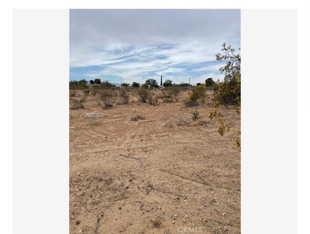 Flat, buildable land just over 1 acre available for sale Ideal for residential use. Easy access just minutes from shopping centers Potential for development Great Location.