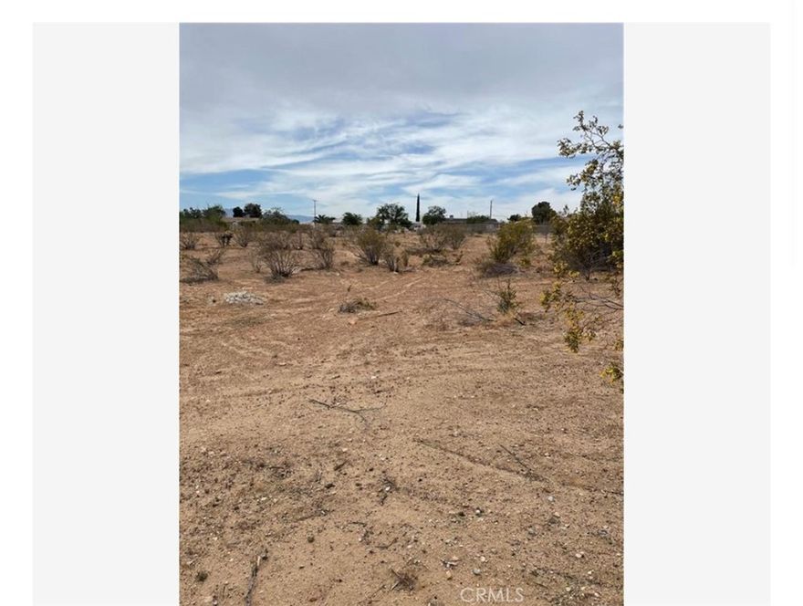 Flat, buildable land just over 1 acre available for sale Ideal for residential use. Easy access just minutes from shopping centers Potential for development Great Location.