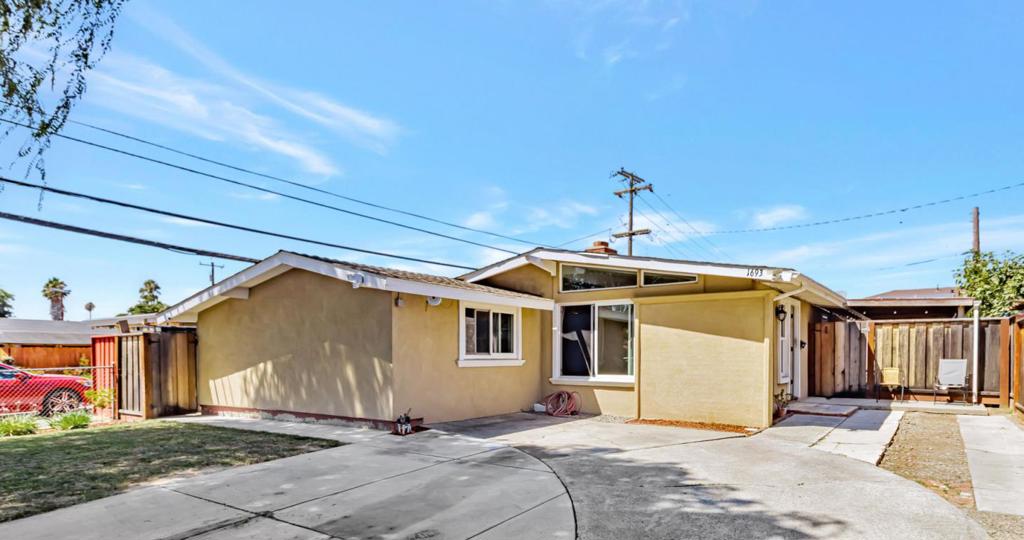 This newly updated home offers an incredible blend of style, comfort, and functionality. Step into a bright and open floor plan featuring vaulted ceilings, skylights, and fresh new paint throughout. The remodeled kitchen shines with granite counters, stainless steel appliances, and plenty of cabinet space. Both bathrooms have been tastefully remodeled with tile showers and floors, new vanities, and modern lighting. A permitted garage conversion provides two additional rooms, perfect for a home office, gym, or guest space. Other highlights include laminate wood flooring, tile flooring, dual-pane windows, a cozy fireplace, and ceiling fans. Outside, enjoy a covered patio, storage shed, and low-maintenance yard. This move-in ready home combines thoughtful upgrades with unbelievable valuedont miss your chance to make it yours!