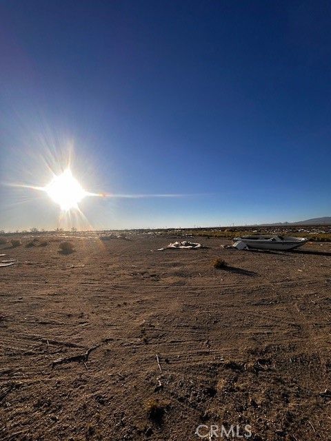 Photo of 2153 Rancho Rd, Phelan, CA 92371 (MLS # HD26054707)