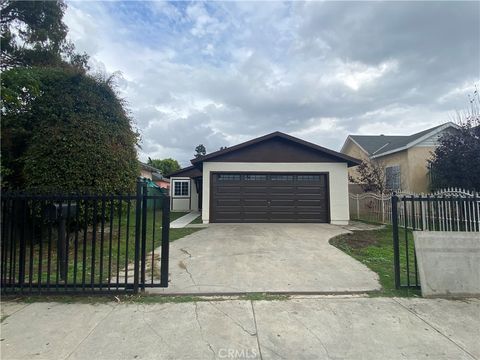 Photo of 6804 Bonsallo Avenue, Los Angeles, CA 90044 (MLS # OC25264738)