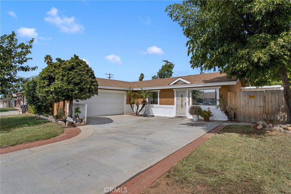 Cute well maintained home in the heart of Moreno Valley. Recent updates done throughout the home, including flooring, bathrooms and kitchen. New roof done approx 2015. Rear yard has large covered patio and yard has lots of room for outdoor gatherings. Great curb appeal with mature landscaping and side load 2 car garage. Don't delay, call your Realtor today!