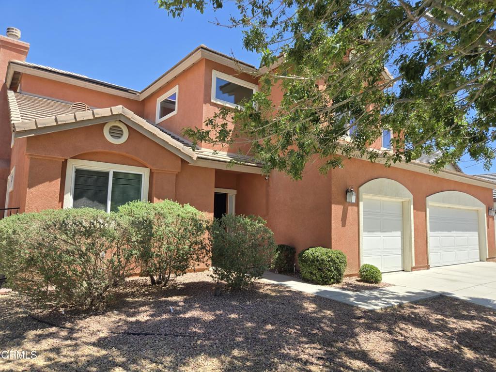 WOW !!!! A huge 3,264 square foot, beautiful 5 bedroom, 5 bath home in a great neighborhood. Both living and family rooms. 3 fireplaces!!!! Modern island kitchen, walk-in pantry, a big Master Suite with a fireplace and a balcony, a downstairs bedroom and bath. 3 car garage, pool or ADU sized lot, and so much more. Let's get real here. For this VERY affordable price you can buy a tiny 1 or 2 bedroom cramped condo in the San Fernando Valley . . . . or the huge home that you deserve.
