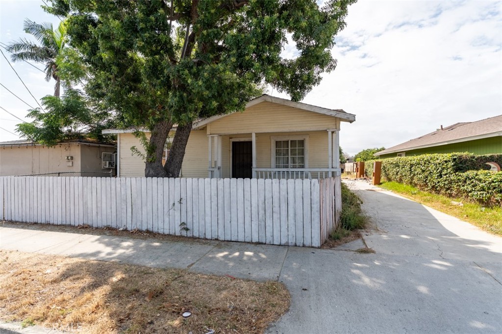 Investor opportunity in Santa Ana! Lease to Purchase option on this home. This detached 2-unit property on a 7,405 sq ft lot is ready for renovation and modernization. Both units feature spacious layouts and offer the potential to increase value with updates. Perfect for investors or owner-occupants looking to add equity in a central location near schools, shopping, and freeways. Sold as-is, this property offers a rare chance to create a high-return investment in a desirable area.