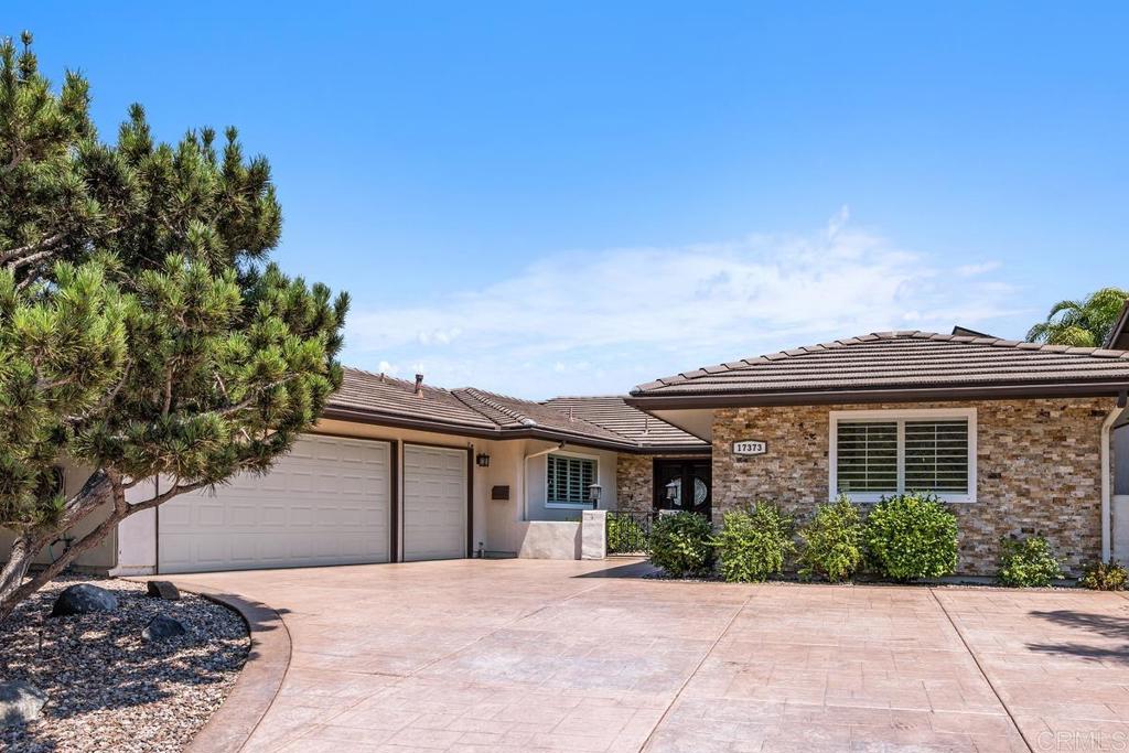 Soak in sweeping mountain views from this stylishly remodeled 3-bedroom, 2.5-bath home, offering approximately 2,500 square feet of bright, open living space in one of North County’s most convenient locations. Designed with a modern lifestyle in mind, the spacious layout flows effortlessly from the sunlit living room to the spacious dining and entertainment area to the chef’s kitchen—perfect for casual mornings, lively dinners, or hosting friends. A flexible third bedroom easily doubles as a home office, studio, or guest retreat. The generous primary suite is a private haven with two walk-in closets and a spa-like ensuite bath. Step outside to a serene, low-maintenance backyard that frames peaceful mountain vistas—ideal for morning coffee or sunset wind-downs. Additional features include owned solar, a 2.5-car garage, and a wide driveway for extra parking or storage. Just minutes to golf courses, parks, top schools, Rancho Bernardo Inn, and the 15 freeway—this home checks every box for comfortable, connected living in a prime location.