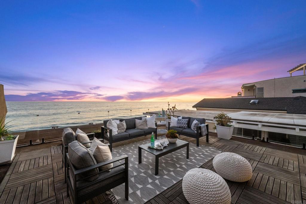 Experience the ultimate in coastal luxury at this South Oceanside OCEANFRONT retreat with a PRIVATE BEACH - Direct Surf Access – Guest House with full kitchen and private entrance! Offering 3 beds + 3 baths with walls of glass framing breathtaking panoramic ocean views from almost every room. Multiple terraces and vast patios, designed for seamless indoor-outdoor living, extend and expand the fabulous spaces for entertaining and relaxation. From whale watching at sunrise to gatherings at sunset, every detail celebrates the beauty of the Pacific Ocean. Perfect walkability to the vibrant downtown scene of South O’s fine dining, boutique shopping, the historic Oceanside Pier, and the California Surf Museum. Gorgeous stones - bespoke finishes - 2 car garage and multiple zone a/c rounds out this beauty! This exceptional property offers a rare blend of serenity and convenience - a seaside sanctuary where every day feels like a five-star vacation with plenty of room to soak up the Southern California coast weather and lifestyle!