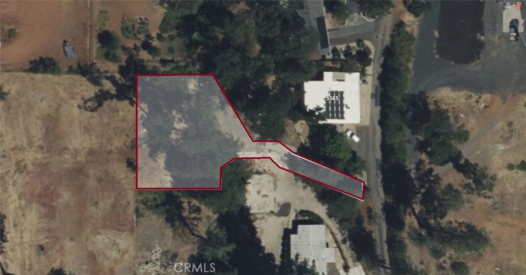 Discover the possibilities on this spacious .23-acre lot tucked along peaceful Travis Road in Paradise. Surrounded by trees and set in a quiet residential neighborhood, this parcel offers a level building area with easy access to town, schools, and local parks. Whether you're ready to build now or planning for the future, this lot provides a welcoming blend of privacy and convenience. With paved road frontage and utilities nearby, it's a prime spot to create something lasting in the foothills.