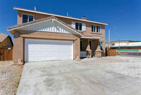 Photo of 12596 Glen Canyon Ln, Victorville, CA 92395 (MLS # HD26044176)