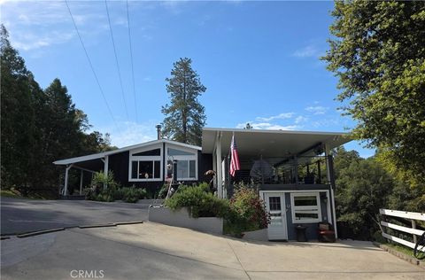 Photo of 50639 Critter Creek Lane, Oakhurst, CA 93644 (MLS # OC26095883)