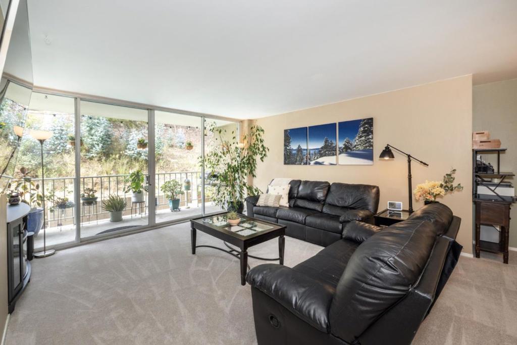 Discover the charm of Belmont living in this cozy 725 sq ft home. Perfectly situated in the Belmont-Redwood Shores Elementary School District, this one-bedroom, one-bathroom residence offers a comfortable and accessible lifestyle. The kitchen is efficiently designed, providing a welcoming space for meal preparation. Enjoy brand new carpet throughout, creating a cohesive and inviting atmosphere. Convenience is at your fingertips with a dedicated laundry facility, ensuring practical daily living. Additional amenities include 2 community pools, ideal for leisure and relaxation, a dedicated exercise room and a 'SkyRoom' that is perfect for entertaining larger gatherings on the top floor. The unit comes with a parking space in the secure garage. With its array of features, this property is an excellent opportunity to experience the vibrant Belmont community.