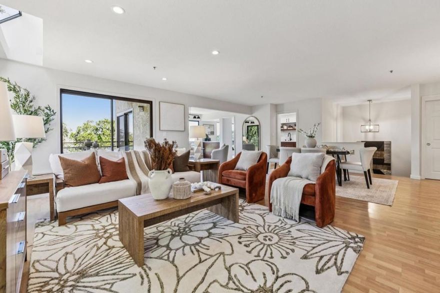 Fabulous opportunity to own a 3BD/2.5BA, spacious townhouse with an open floor plan, bedrooms on one level, and wonderful canyon and peek-a-boo Bay views. The main level is designed for effortless enjoyment and features living, dining and family room areas that blend together seamlessly, offer direct access to a deck, and are framed with windows and sliding glass doors that showcase the tranquil views and bring in natural light. On this level, you will also find a formal entryway, powder room, dedicated laundry room, and beautifully remodeled Euro style kitchen with Bosch appliances, sleek cabinets, and breakfast area where you can watch the sunrise. The lower level boasts a primary bedroom with private patio, ensuite bath and three sizeable closets, two additional bedrooms, and a second full bath. Additional highlights include approximately 2113 sq ft of living space (per tax records), 2-car garage, new carpet, new paint, fireplace with gas starter, skylight, central air conditioning, and Nest thermostat. Convenient location just minutes to Highland Park and downtown shops, restaurants and cafes, and with easy access to Caltrain and Highway 101 and 280 commute arteries. Top-rated San Carlos schools (buyer to verify eligibility). Come enjoy life in "The City of Good Living"!