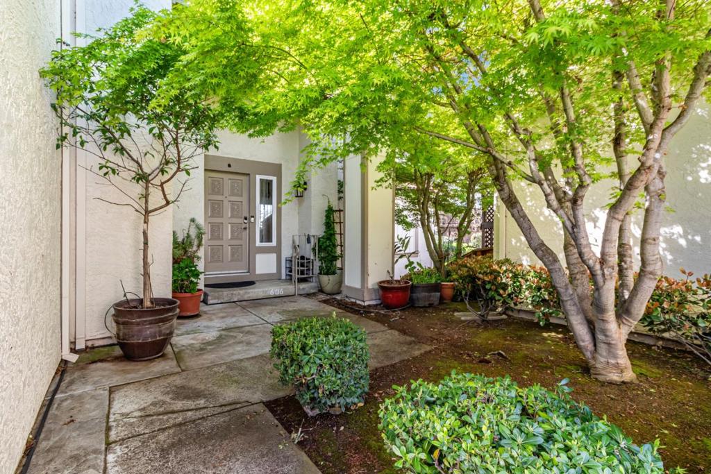 Welcome to this charming San Jose home featuring 3 bedrooms and 3 full bathrooms, perfectly situated within the Oak Grove Elementary School District. The thoughtfully designed kitchen is a chef's dream, boasting quartz countertops, an oven range with electric stove, dishwasher, garbage disposal, and refrigerator. The kitchen seamlessly integrates with the family room, creating a welcoming space for gatherings. Enjoy the elegance of hardwood flooring throughout the home and relax by the cozy fireplace in the living area. The home is equipped with central AC and solar-powered heating, ensuring comfort and efficiency, supplemented by solar options . High ceilings and vaulted accents add to the spacious feel of the residence. Laundry is conveniently located in the garage with epoxy floor , which also features a washer and dryer, along with an electric vehicle hookup (Level 2, 240 volts). The home is outfitted with double pane windows and Energy Star appliances, enhancing its energy efficiency.The long deck (with permit) with back yard hill view, and out door sink, propane heater and bbq grill.The two long motorize awnings open out over the deck.Toto commodes with full warm water bidets . Attic for more storage and many mores . Don't miss the opportunity to make this lovely your own !