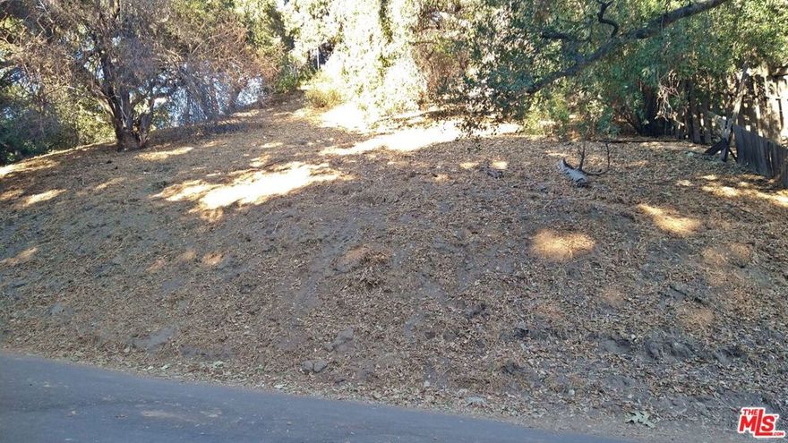 This is a fantastic opportunity to build your dream home in Sylmar's coveted Lower Kagel Canyon neighborhood, offering a unique blend of serene rural living and convenient access to urban amenities. With a gently sloping lot and a prime location, you can design a home that fits your vision while enjoying the tranquility of the area. Only 5 minutes from Foothill Blvd, the 210 and 118 Freeways, making it easy to commute or explore Los Angeles and the San Fernando Valley. Just 30 minutes from Downtown LA, UCLA, Universal City Walk, Warner Brothers, NBC, Disney, and Burbank Airport. You'll have the best of both worlds - peaceful living with easy access to city amenities. Nearby attractions include the Angeles and El Cariso Golf Clubs, Gravity Hill, Descanso Gardens, Hansen Recreation Center, and more. Enjoy a range of outdoor activities just minutes from home. Water and electricity appear to be available at the street, making it easier for you to connect the necessary utilities to your new home. This property offers the chance to create a private retreat in a highly desirable location, yet still close enough to all the excitement and opportunities that LA has to offer. If you're looking for a tranquil setting with access to major conveniences and attractions, this land is worth considering! Contact us today for more details or to schedule a viewing.