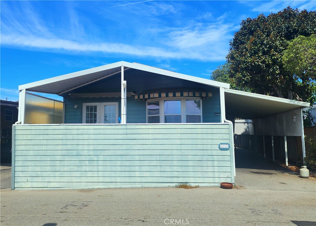Now is your chance for a water view home in this sought after 55 and older community. This home boasts two bedrooms, two bathrooms as well as a den area that can be made into a third bedroom or office. The kitchen area is open to the living area which is great for entertaining. Not only can you enjoy the beautiful water view, but the backyard has tons of room for you to make it your own. Park amenities include year-round heated pool, spa, fitness center, billiard room, clubhouse and library. Accessed by a 24 hour attendant gate. Park is adjacent to the Cerritos Bahia Marina, across the road from Bixby Village Golf Course, Marina Pacifica Shopping Center and 2nd & PCH Center. Easy freeway access (405,605,22), minutes from Trader Joe's, Ralph's, Whole Foods, Gelson's, Target, restaurants and movies. Monthly space rent of $2300.00 plus $64.74 gate fee, $32.05 trash service fee and individually metered gas, electric and water. Buyers must obtain park approval to purchase.