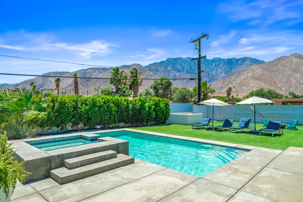 Discover your ideal desert retreat at 835 Rosa Parks Drive in vibrant Palm Springs. Set on a generous quarter-acre lot, this beautifully maintained 3-bedroom, 2-bath home offers nearly 1,300 square feet of living space, thoughtfully designed to maximize comfort, style, and livability. With its unobstructed mountain views, modern upgrades, and prime location, this home offers a unique opportunity for full-time living, a seasonal escape, or a highly desirable short-term rental.Step inside to an open and inviting floor plan that makes everyday living and entertaining feel effortless. The living room and dining area flow seamlessly into a well-equipped kitchen, all filled with natural light. Neutral finishes and clean lines offer a perfect canvas for your personal style while maintaining a timeless aesthetic.The spacious backyard is a true highlight--designed for year-round enjoyment. Take in the dramatic desert skies and iconic San Jacinto mountain views as you lounge, dine al fresco, or rinse off in the outdoor shower after a day of sun. A cozy firepit adds ambiance for evening gatherings, while the expansive layout offers plenty of room to add a pool or customize the space to fit your vision.Modern conveniences enhance the home's long-term value and livability, including owned solar panels and EV charging, delivering energy efficiency and eco-conscious living. Inside, the layout offers flexibility for a variety of lifestyles, whether you're hosting guests, working remotely, or relaxing in your private desert getaway.Tucked away in a quiet residential neighborhood just minutes from downtown Palm Springs, you'll enjoy the best of both worlds: peace and privacy at home, with quick access to world-class dining, shopping, hiking, golf, and the airport.Whether you're seeking an investment property, a weekend retreat, or a place to call home, 835 Rosa Parks Drive checks every box--location, lifestyle, efficiency, and short-term rental potential--in one of the most sought-after destinations in the desert.