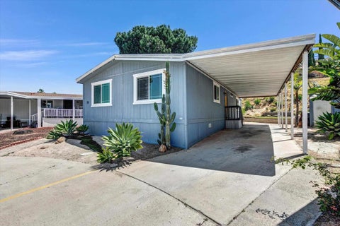 Photo of 12690 Jackson Hill Dr DR #25, El Cajon, CA 92021 (MLS # 260023717SD)